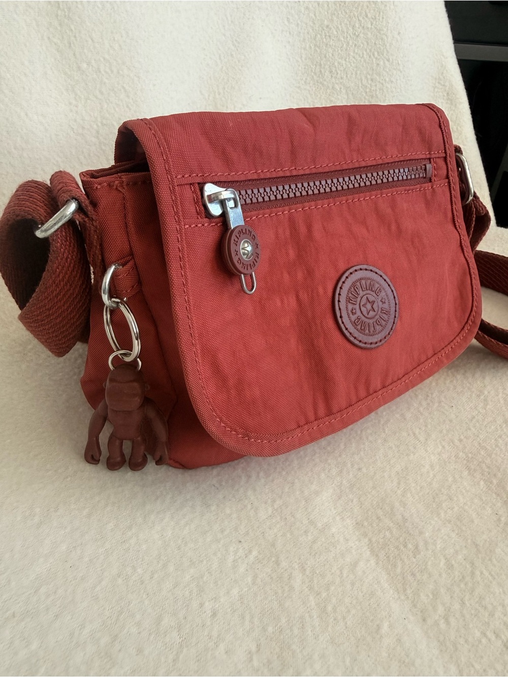 Kipling Burnt burgundy Crossbody Bag with Monkey Charm